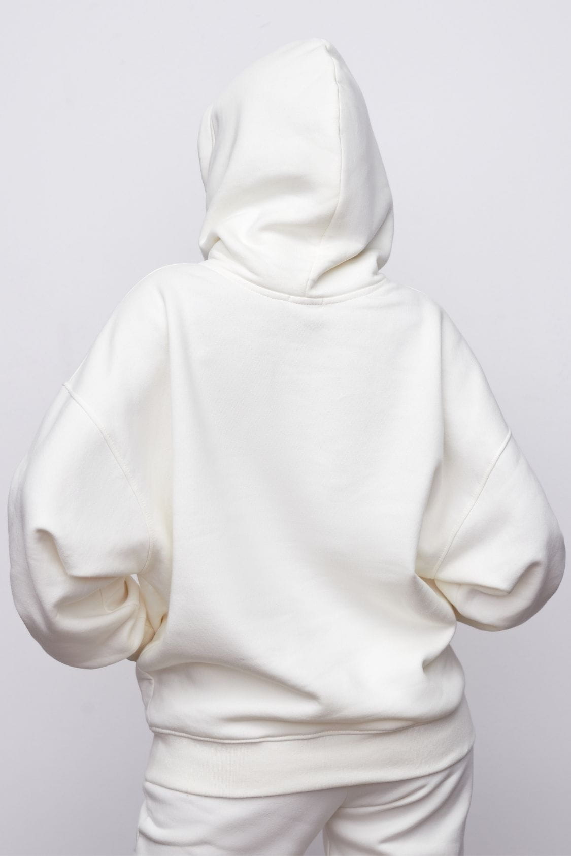 Bawełniana bluza damska oversize długa z kapturem, biała - Holystic